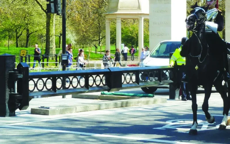 IWA 14-1 manual lockdown security gate with decorative fretwork deployed across a road at a UK government site