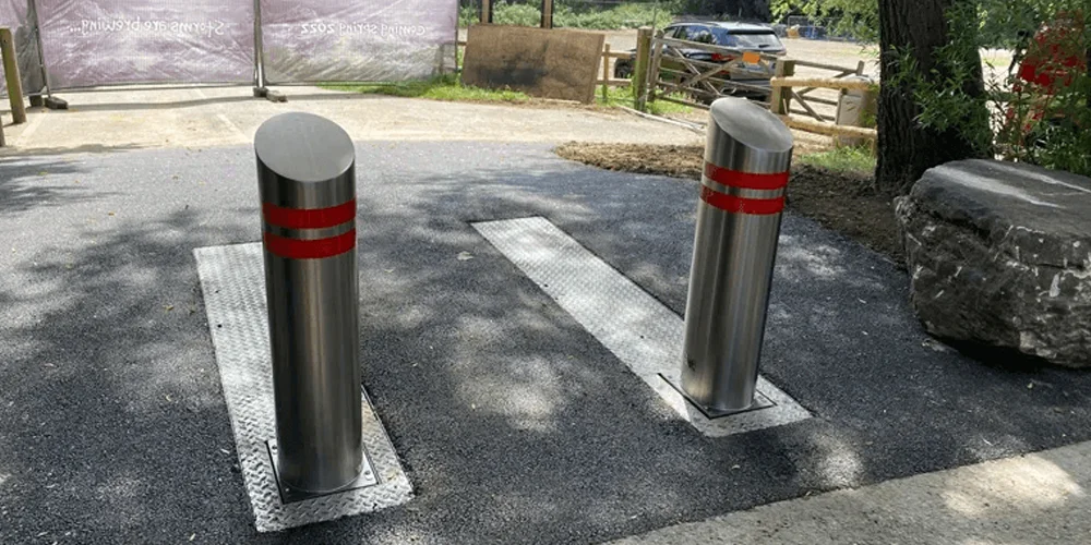 Stainless steel vehicle barrier bollards installed for hostile vehicle mitigation at a Canadian facility